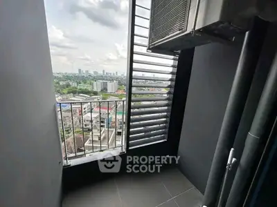 Modern balcony with city view, perfect for relaxation and enjoying the skyline.