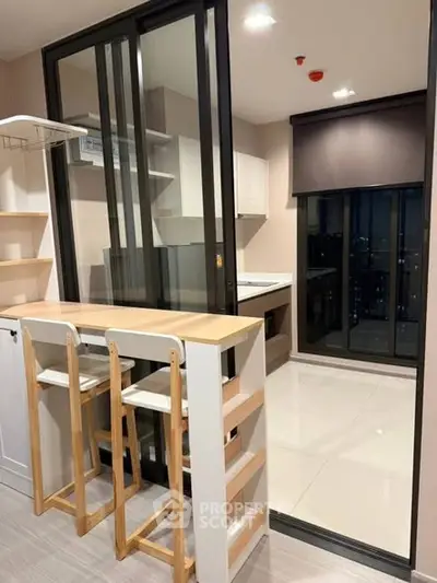 Modern kitchen with open layout and sleek design in a high-rise apartment