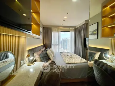 Luxurious bedroom with city view, elegant decor, and cozy ambiance in modern apartment.