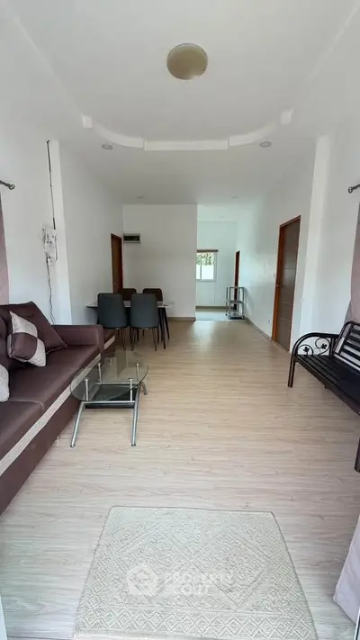 Spacious living room with modern furniture and elegant decor