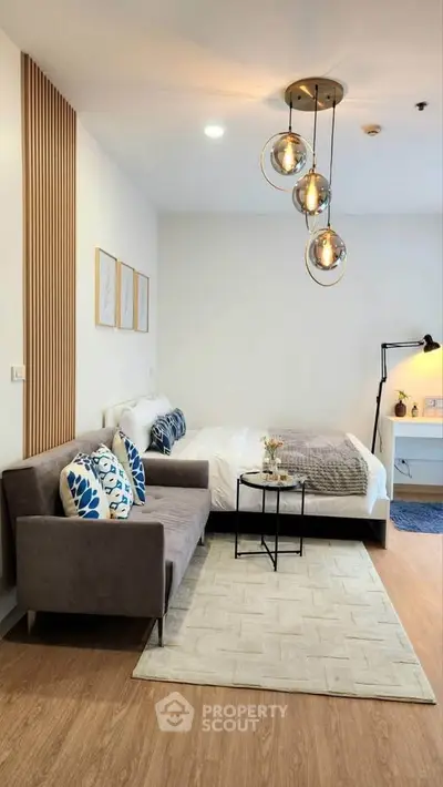 Modern bedroom with stylish decor and cozy seating area