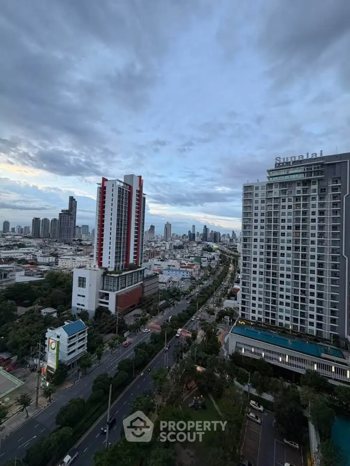 Stunning cityscape view showcasing modern high-rise buildings and lush greenery, perfect for urban living.