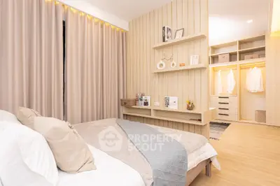 Spacious modern bedroom with walk-in closet and elegant decor