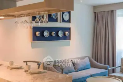 Modern living room with elegant decor and cozy seating area.