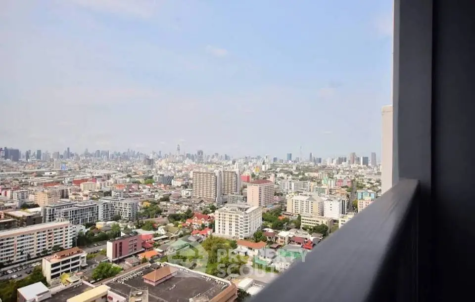 Stunning cityscape view from high-rise balcony, perfect for urban living enthusiasts.