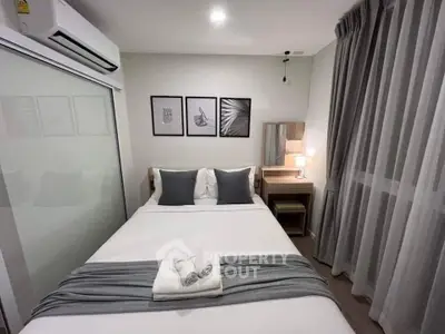 Cozy modern bedroom with stylish decor and natural light