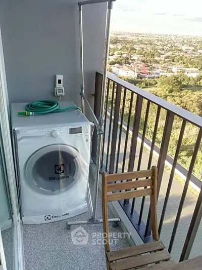 Charming balcony with washing machine and scenic city view
