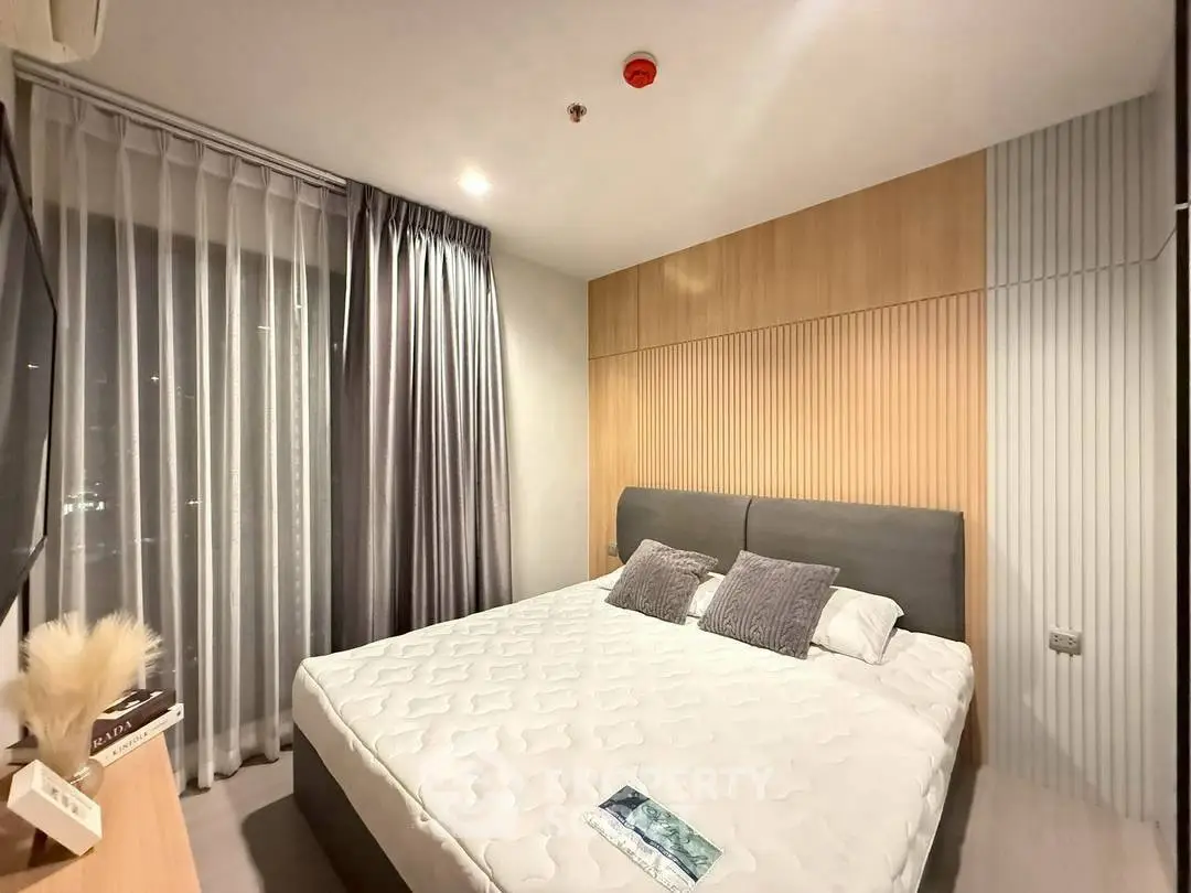 Modern bedroom with stylish decor and cozy ambiance