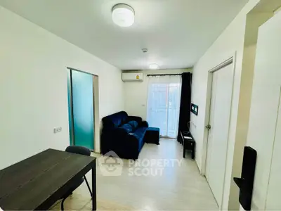 Modern living room with sleek furniture and natural light