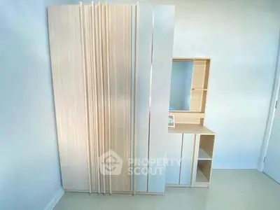 Modern minimalist bedroom wardrobe with sleek design and ample storage space