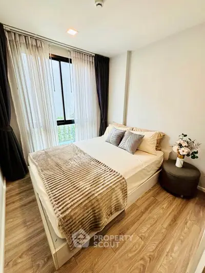 Cozy bedroom with elegant decor and natural light