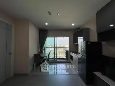 Modern apartment with open kitchen and balcony view