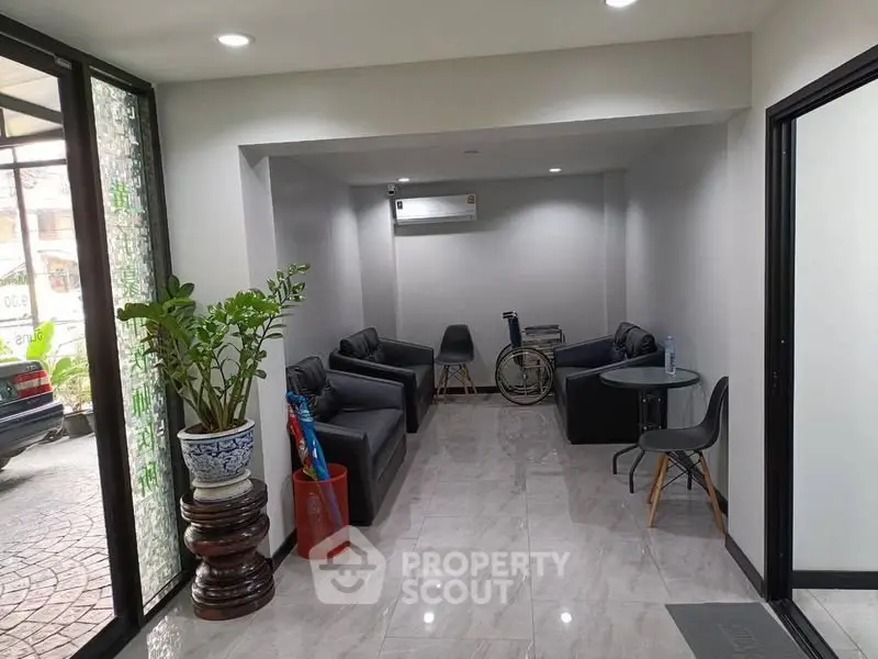 Modern lobby area with sleek seating and natural light, perfect for welcoming guests.