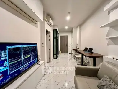 Modern living room with sleek design, marble flooring, and integrated workspace, perfect for urban living.