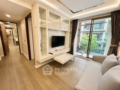 Elegant living room with modern decor and balcony view in luxury apartment