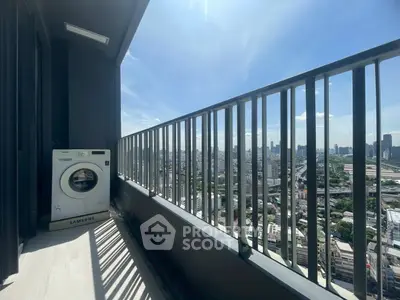 Stunning high-rise balcony with cityscape view and washing machine