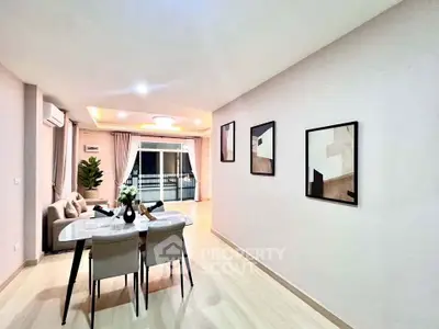 Spacious modern living room with elegant dining area and stylish decor