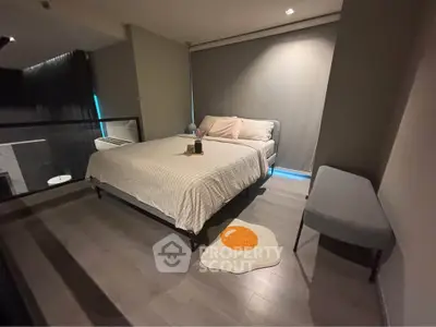 Modern bedroom with stylish decor and cozy ambiance in a contemporary apartment.