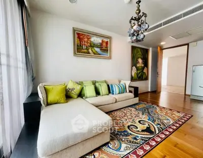 Luxurious living room with elegant decor and plush sofa in modern apartment