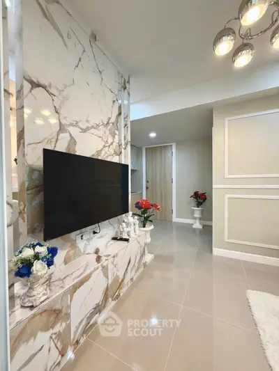 Luxurious living room with marble accents and modern lighting