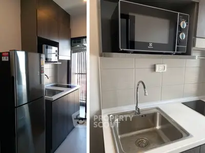 Modern kitchen with sleek appliances and stylish cabinetry, featuring a microwave and stainless steel sink.