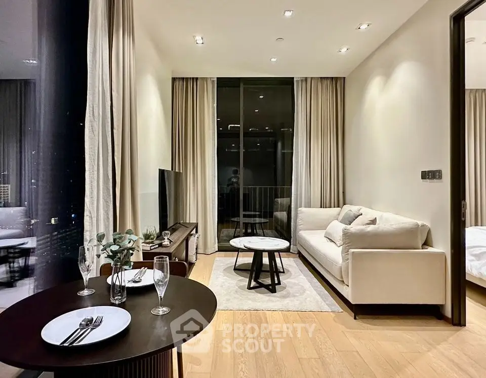 Elegant modern living room with cozy sofa and stylish decor in a luxury apartment.