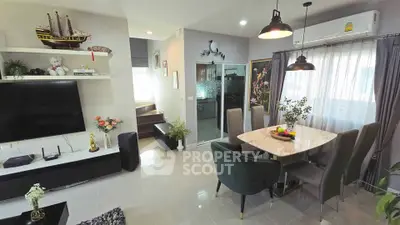 Stylish modern living room with dining area and elegant decor