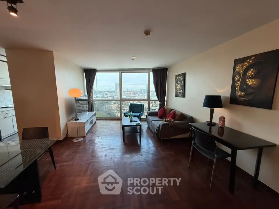 Spacious living room with city view, modern decor, and wooden flooring in high-rise apartment.
