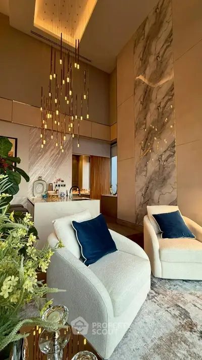 Luxurious living room with elegant lighting and plush seating in a modern high-rise apartment.