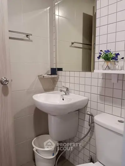 Modern bathroom with sleek fixtures and stylish tile design
