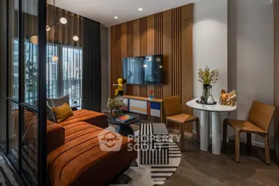 Stylish modern living room with chic decor and vibrant furniture in a contemporary apartment.