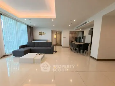 Spacious modern living room with elegant dining area and large windows