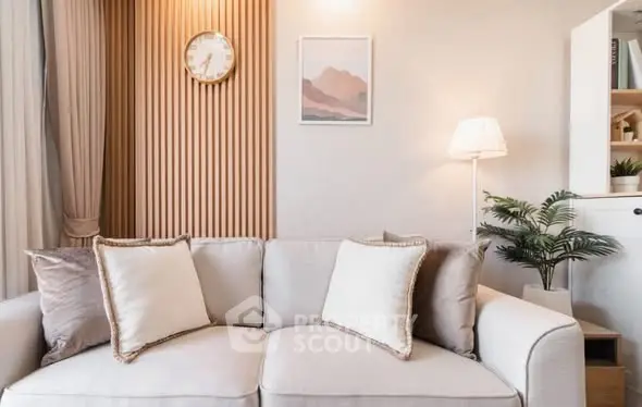 Elegant living room with cozy sofa and stylish decor