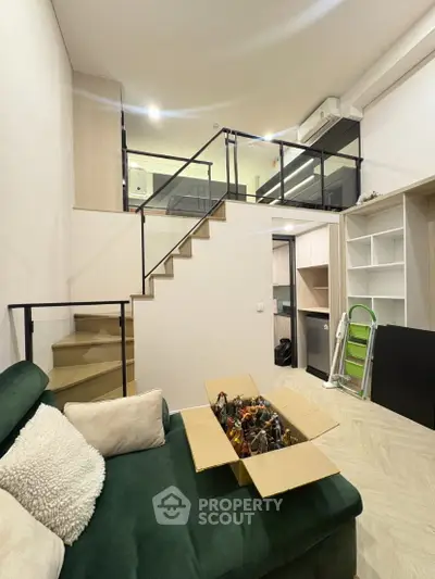 Modern loft apartment with mezzanine and stylish interior design
