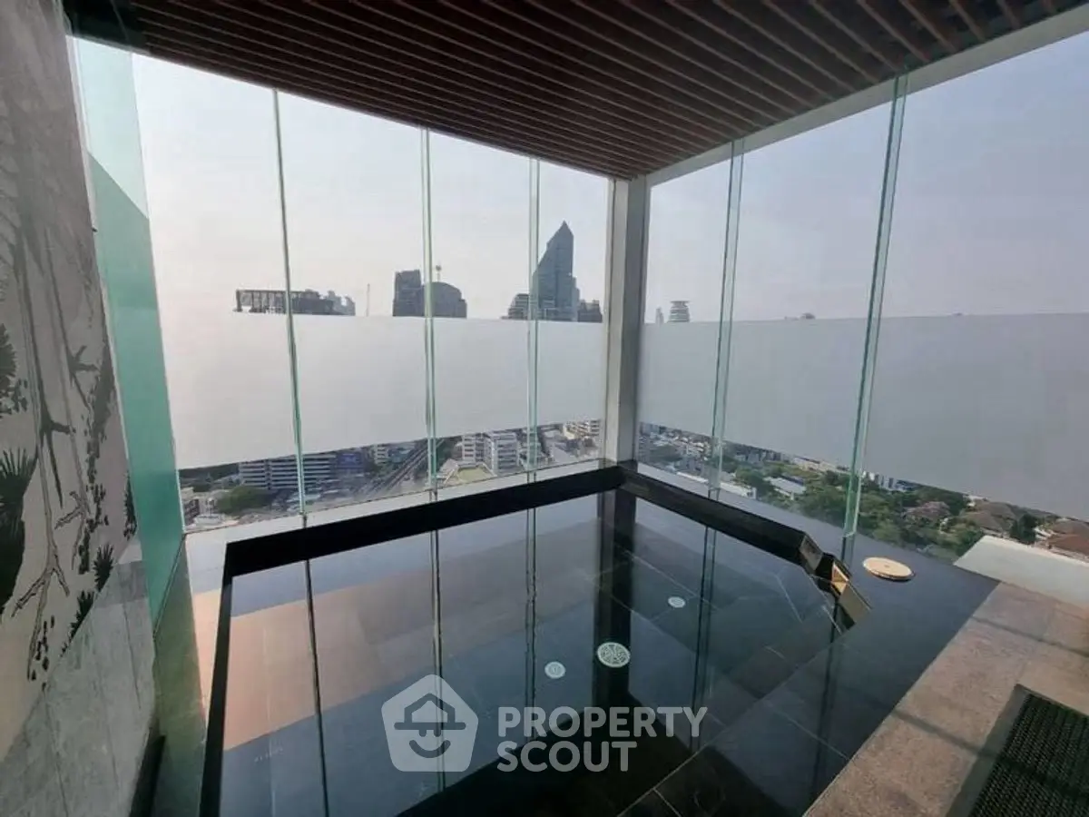 Luxurious rooftop pool with stunning city skyline view