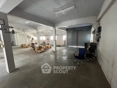 Spacious industrial warehouse with ample storage and office space, ideal for business operations.