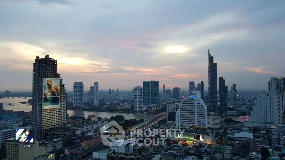 Stunning cityscape view with modern skyscrapers at sunset, showcasing urban living.