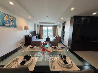 Elegant dining area with modern decor and spacious living room view