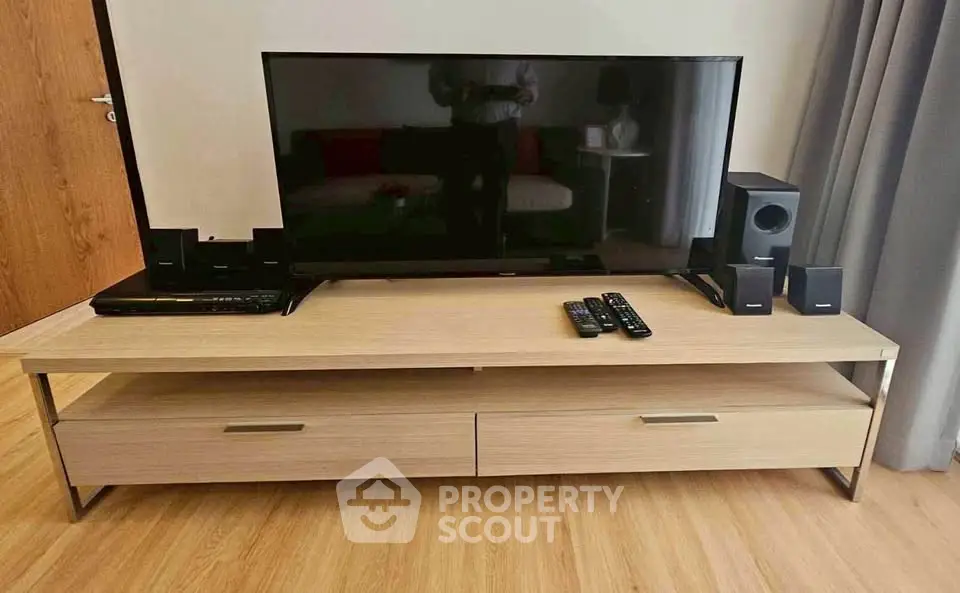 Modern living room with sleek TV stand and entertainment system