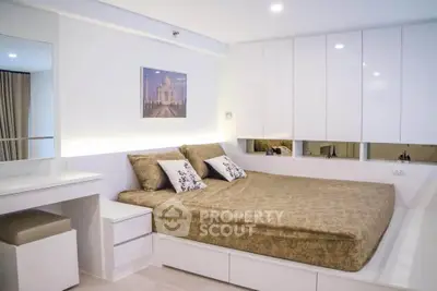 Modern bedroom with elegant decor and built-in storage solutions