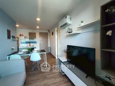 Modern open-plan living room with dining area and stylish decor