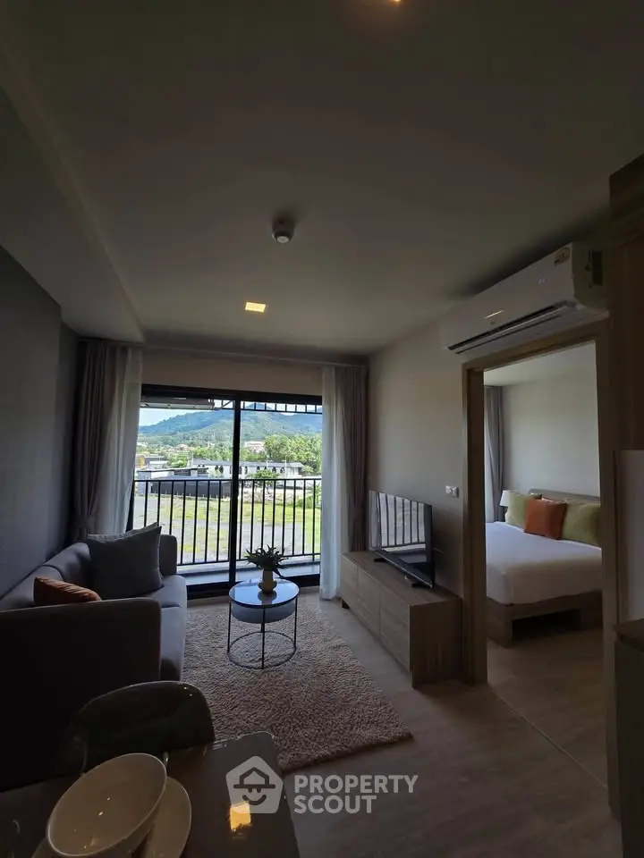 Modern living room with balcony view in stylish apartment