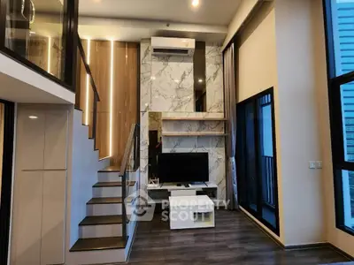 Modern duplex living room with high ceilings and stylish decor