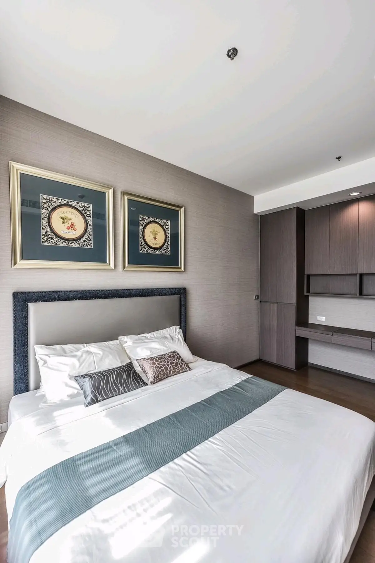 Modern bedroom with stylish decor and natural light