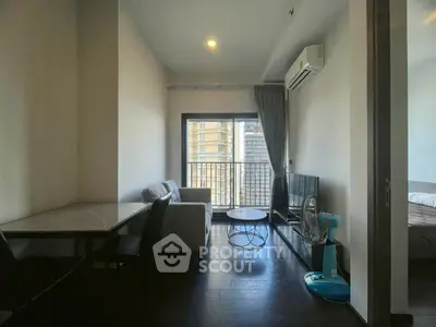 Modern living room with balcony view in urban apartment