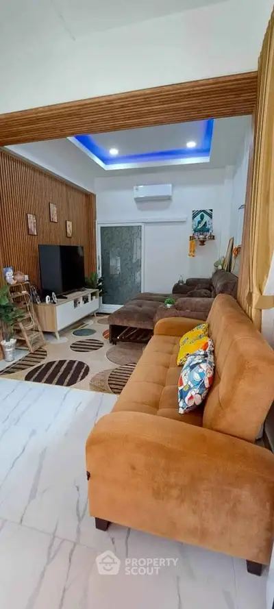 Modern living room with stylish decor and cozy seating area