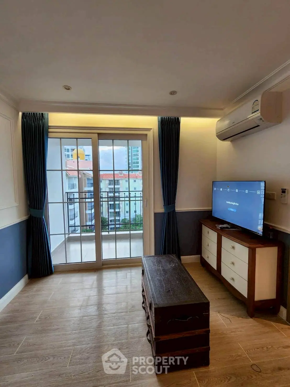 Modern living room with balcony view and stylish decor