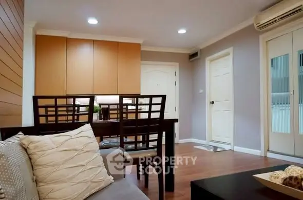 Modern living room with stylish furniture and warm lighting