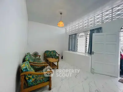 Cozy living room with vintage furniture and natural light