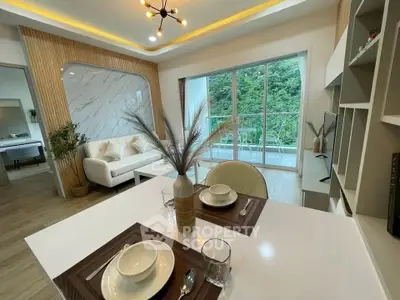 Modern living room with elegant decor and balcony view